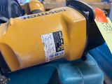 a yellow machine that has a price tag on it