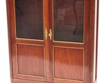 an image of a wooden cabinet with glass doors and brass handles