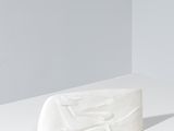 sculpture of a white rectangular object on a white surface