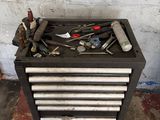 a tool box with many tools on top of it