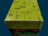 a box of puzzle pieces sitting on a table