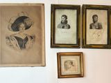 three framed pictures on the wall of a room
