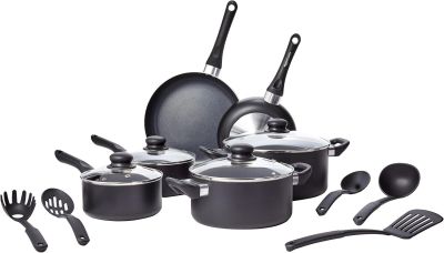 an image of a set of pots and pans with utensils