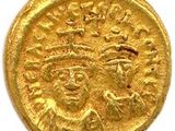 une pièce d'or portant l'image d'un homme et d'une femme