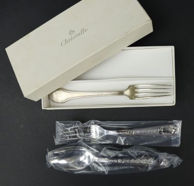 silverware in a white box with a silver spoon and fork