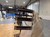 a large room with a lot of heaters on the floor
