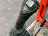 a close up view of a remote control on a tractor