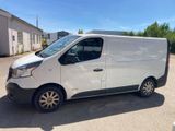 a white van parked in a parking lot
