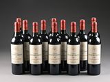 six bottles of red wine are lined up in a row