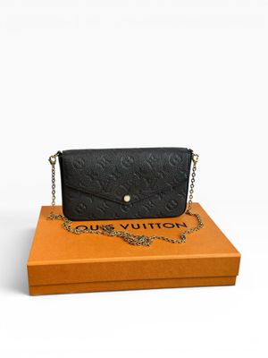 Portefeuille Louis Vuitton en cuir noir à motif Monogramme, avec lanière à chaîne