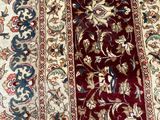 an image of a close up of a rug on a floor