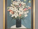a painting of flowers in a vase on a easel