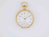 a gold pocket watch with a white face on a white surface