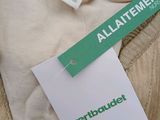 a label on a shirt that says all - attement