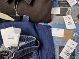 a pile of clothing that is sitting on a table