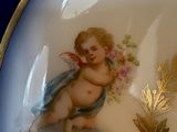 a plate with a picture of an angel on it