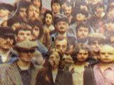 a picture of a group of people posing for a picture