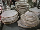 a lot of plates stacked on top of each other