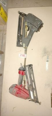 a couple of tools hanging on a wall in a room