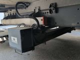 a close up of a truck ' s rear end with a box attached to it