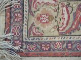 a close up of a rug with fringes on it