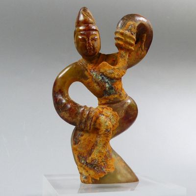 statue of a woman holding a child in her arms