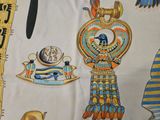 an image of a table cloth with egyptian designs on it