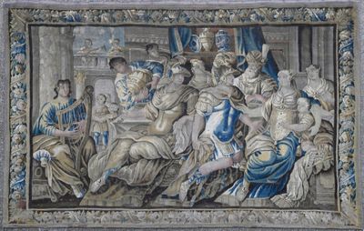 peinture d'un groupe de personnes assises autour d'une table dans une pièce