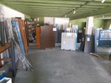 a room filled with lots of different types of furniture