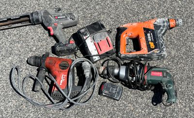 many tools that are laying out on the floor