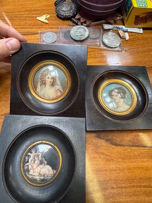 three pictures of a woman and a man on a table