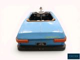 a toy car that is sitting on top of a table