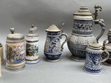 many different types of beer mugs on the table