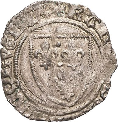 an old silver coin with a crown on it