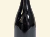 a bottle of wine that is sitting on a table