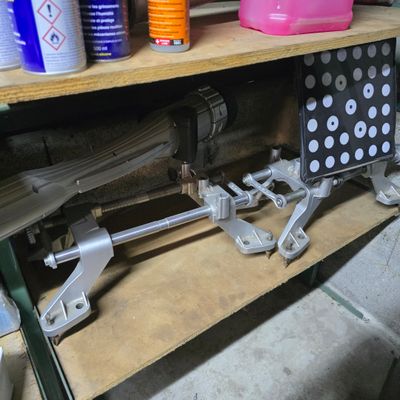 a shelf that has a bunch of tools on it