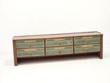 an image of a wooden dresser with four drawers on top of it