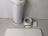 an image of a trash can and a remote control