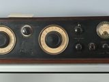 a radio sitting on top of a shelf in a room