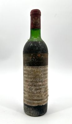 a bottle of wine that is sitting on a table