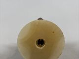 an image of a piece of wood with a hole in it