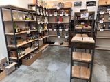 a room with shelves and shelves filled with bottles of alcohol