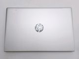 hp laptop computer sitting on a table with a white background