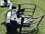 an image of a fork attachment in the grass