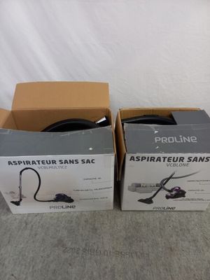 deux boîtes d'Asspateur Sanss posées par terre l'une à côté de l'autre