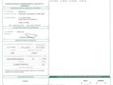 a green and white document with a barcode on it