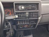 a car dashboard with various electronic controls and dashboard controls