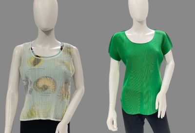 two mannequins wearing different colored tops and black pants