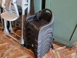 a suitcase sitting on the floor next to a chair