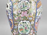 an image of a vase with a floral design on it